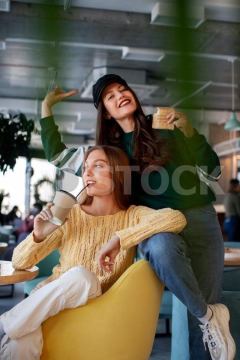 Front view women holding paper wrapped sandwich 23 2151311182 jpg