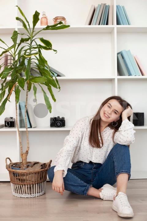 Young girl white shirt plant 23 2148462962 jpg