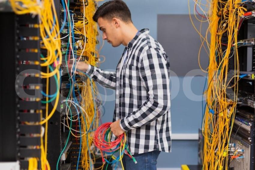 Young network engineer with ethernet wires medium shot 23 2148323470 jpg 1